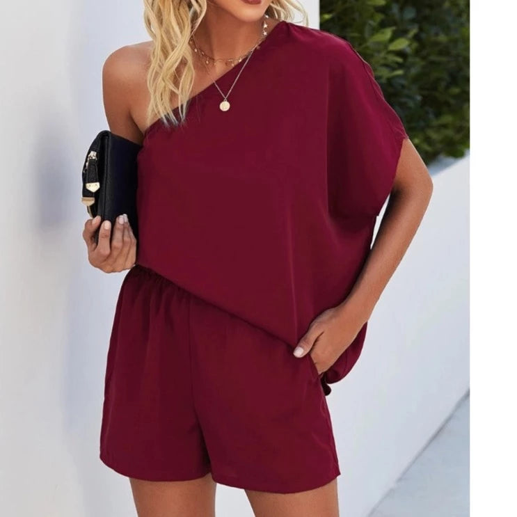 Fashion Forward Femininity One Shoulder Romper in Wine